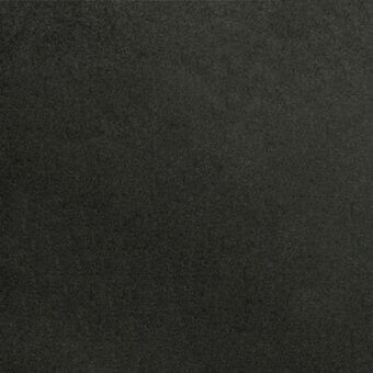 Dark gray fabric sample displaying a dense, granular woven texture with mottled tonal variations and white “pacini & cappellini” branding.